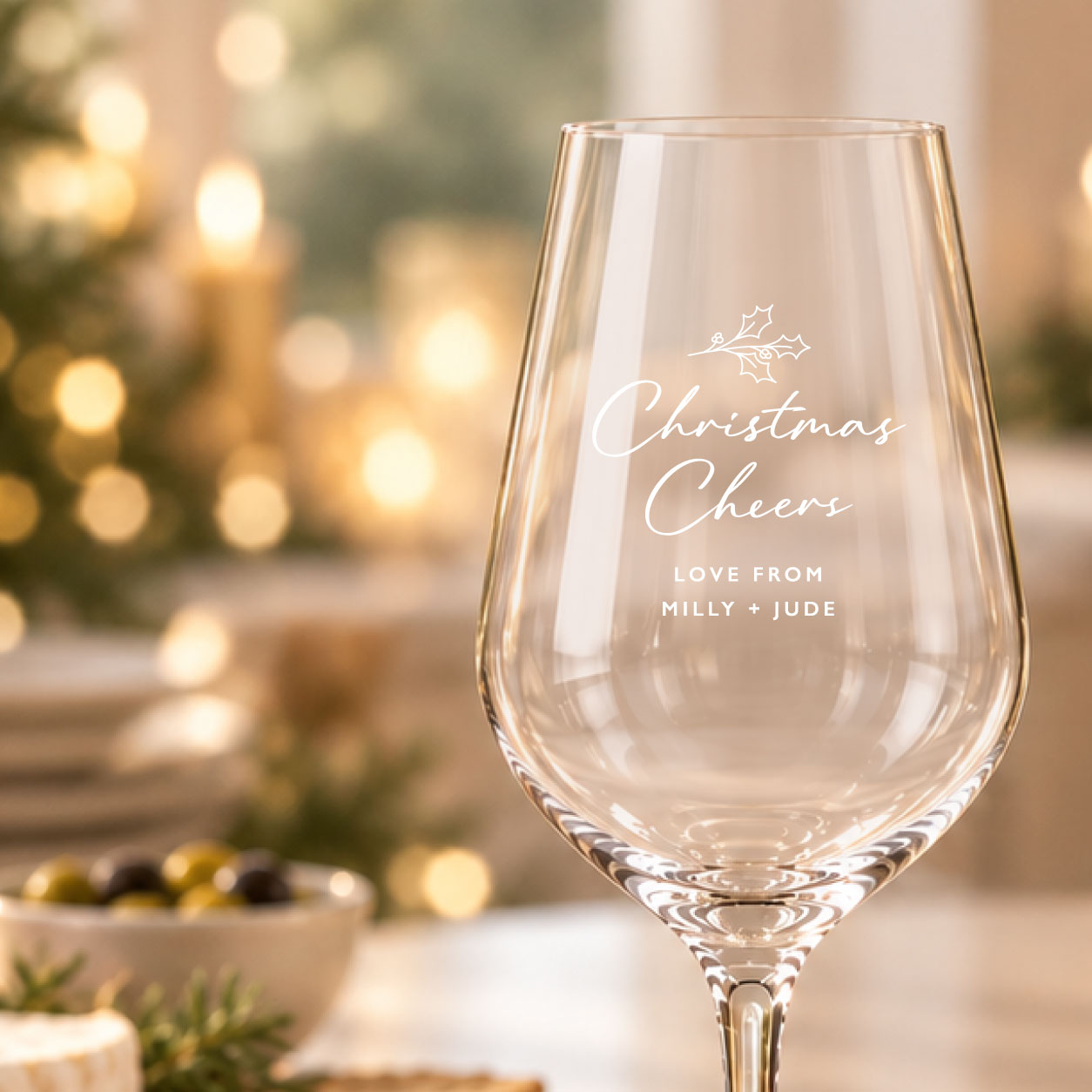 Personalised crystalite wine glass with Christmas Cheers engraving.