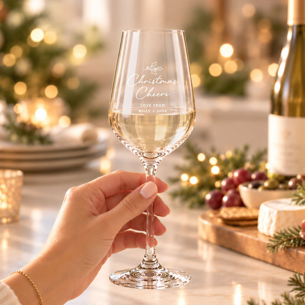 Personalised crystalite wine glass with Christmas Cheers engraving.