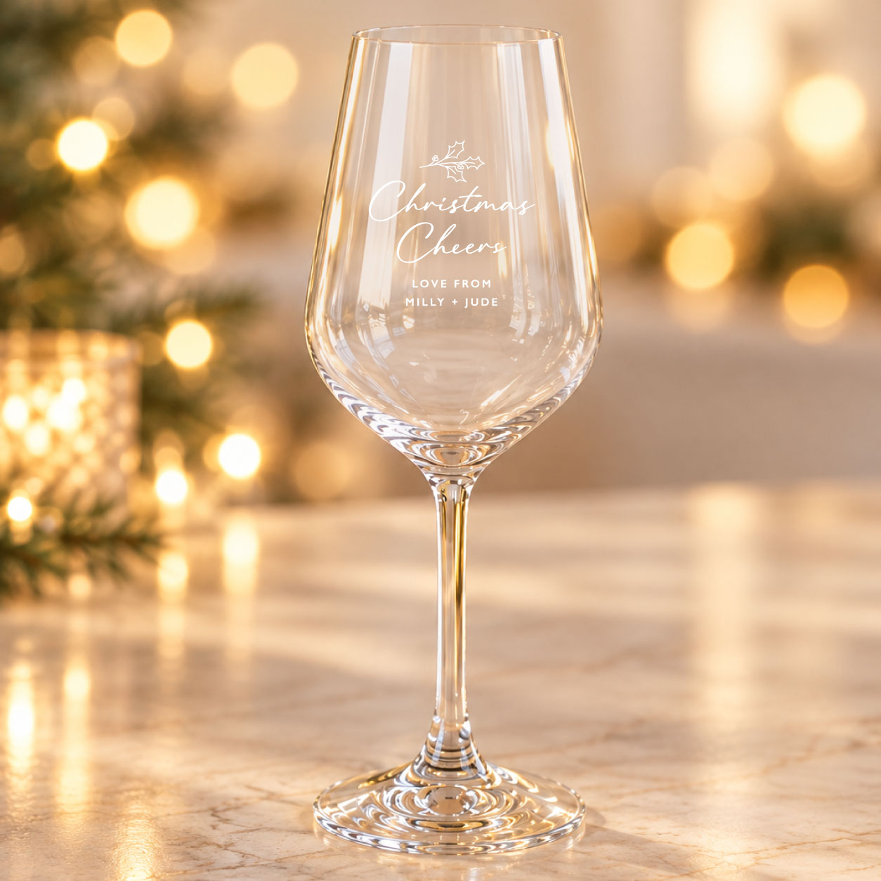 Personalised crystalite wine glass with Christmas Cheers engraving.