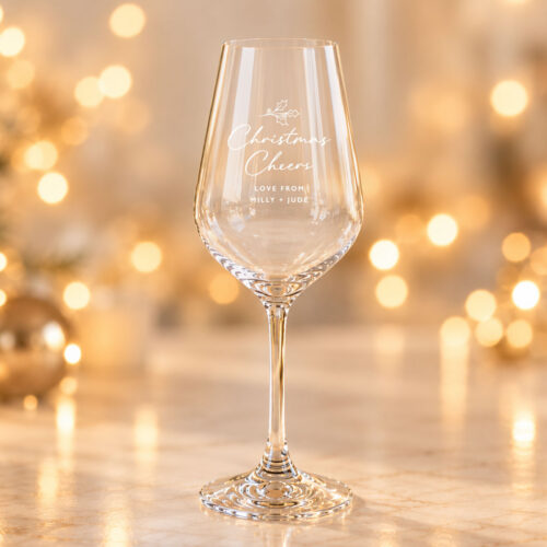 Personalised crystalite wine glass with Christmas Cheers engraving.